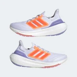 ADIDAS Women's Ultraboost Light Running Shoe - Ftwr White/Solar Red/Beam Pink - Regular (B) -Sport Footwear Shop 01bf57a00c1544999684af9c01358231 9366
