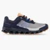 On Running Women's Cloudvista Trail Shoe - Midnight/Copper- Regular (B) -Sport Footwear Shop 64.98592 cloudvista fw22 midnight copper w g1