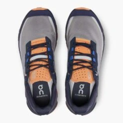 On Running Women's Cloudvista Trail Shoe - Midnight/Copper- Regular (B) -Sport Footwear Shop 64.98592 cloudvista fw22 midnight copper w g2