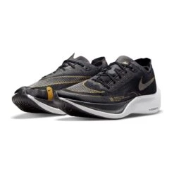 Nike Men's ZoomX Vaporfly Next % 2 Racing Shoe - Black/White/Metallic Gold Coin - Regular (D) 13 Nike Men's ZoomX Vaporfly Next % 2 Racing Shoe - Black/White/Metallic Gold Coin - Regular (D) -Sport Footwear Shop CU4111 001 PHCFH001 1500